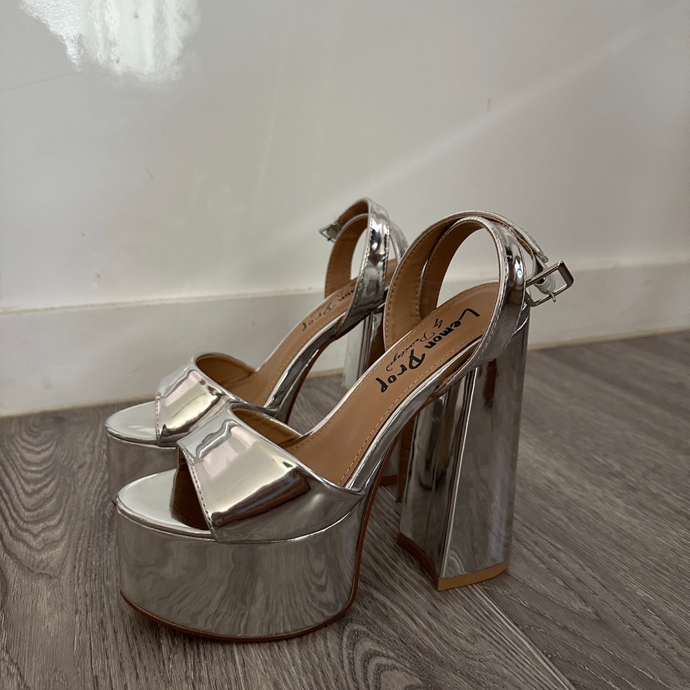 *Never Worn* SILVER PLATFORM HEELS